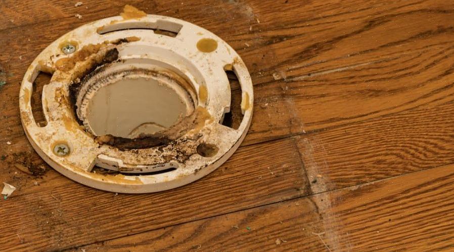 En toalettflens er en sirkulær rørmontering som forbinder toalettet ditt med gulvet
