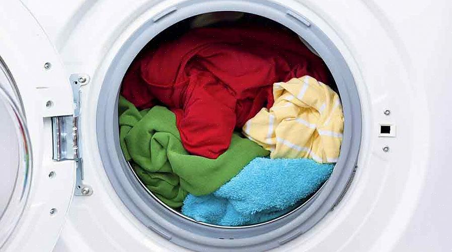 Slik laster du inn en standard vaskemaskin for topplast
